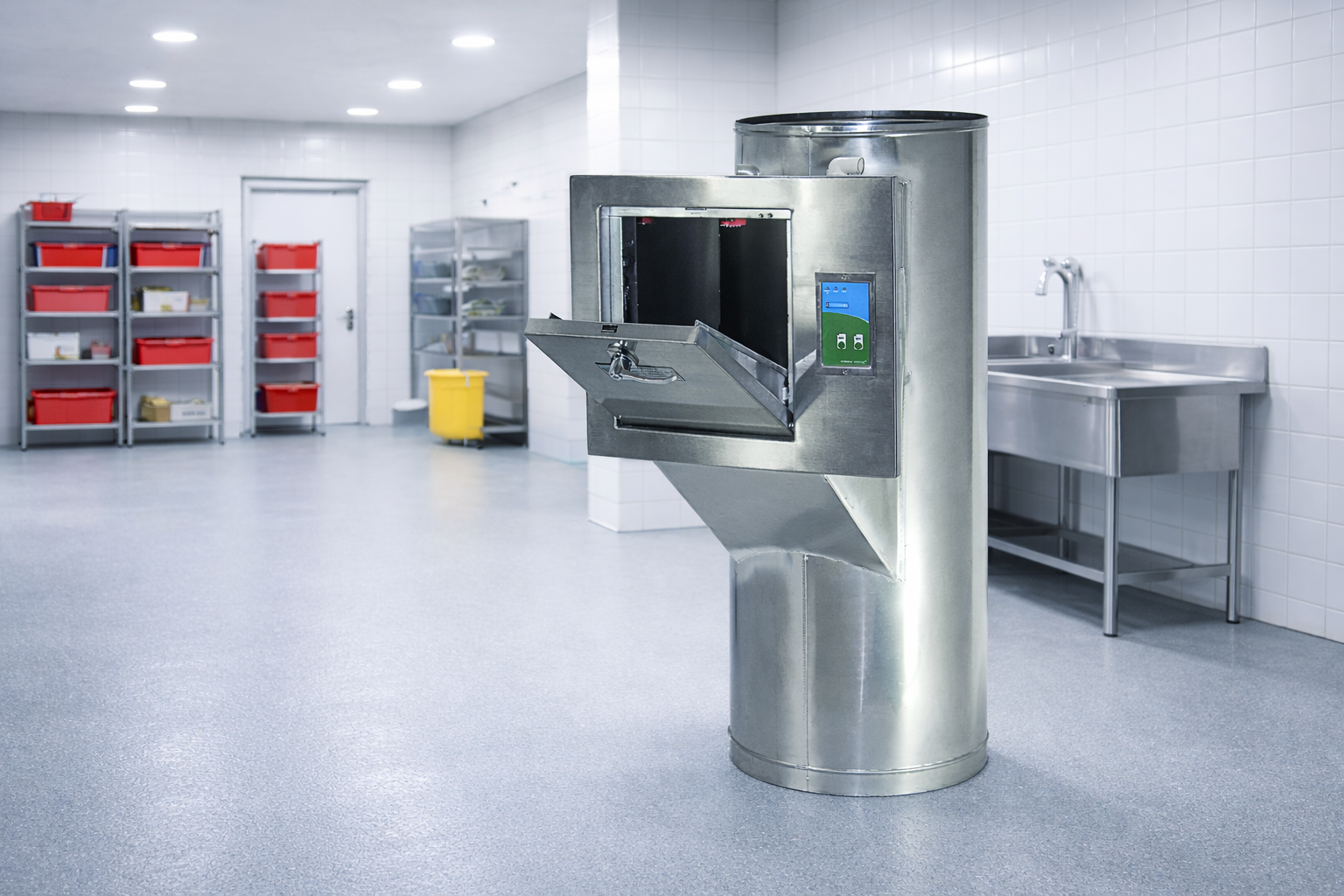 Stainless steel garbage chute system installed in a commercial facility with hygienic industrial surroundings